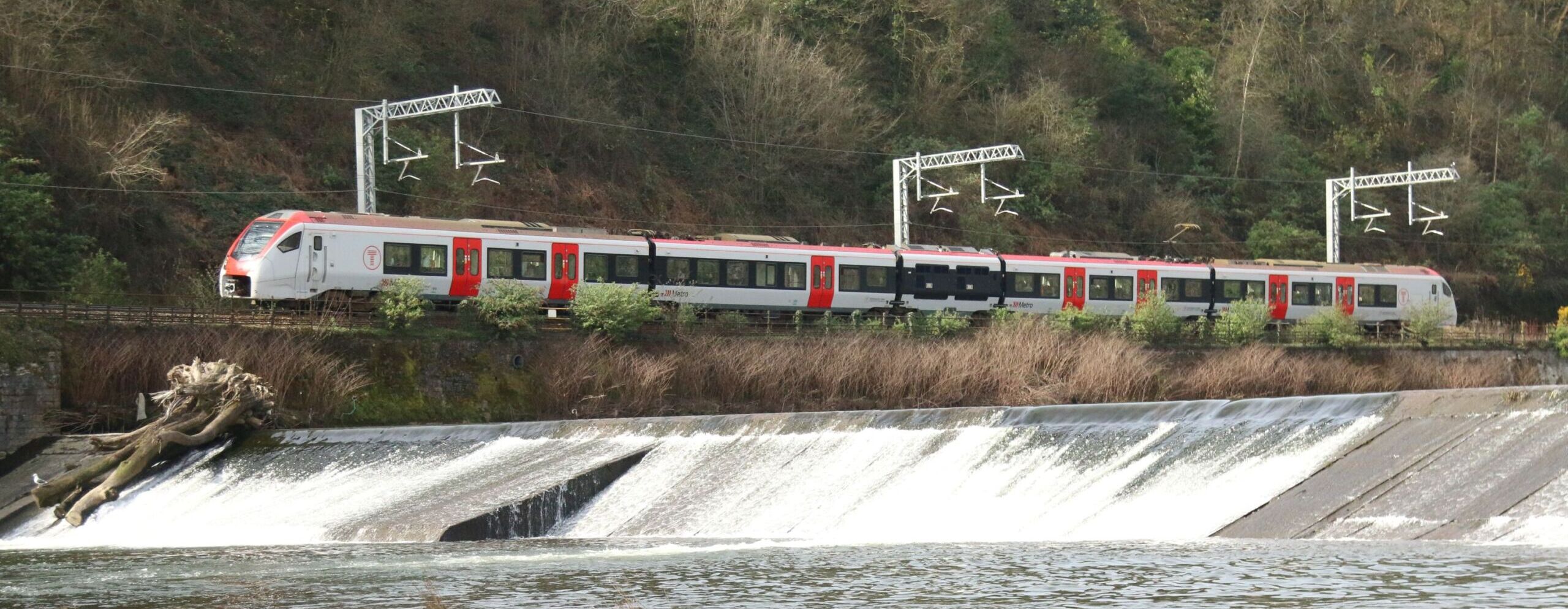 A Transport for Wales train at Radyr Weir